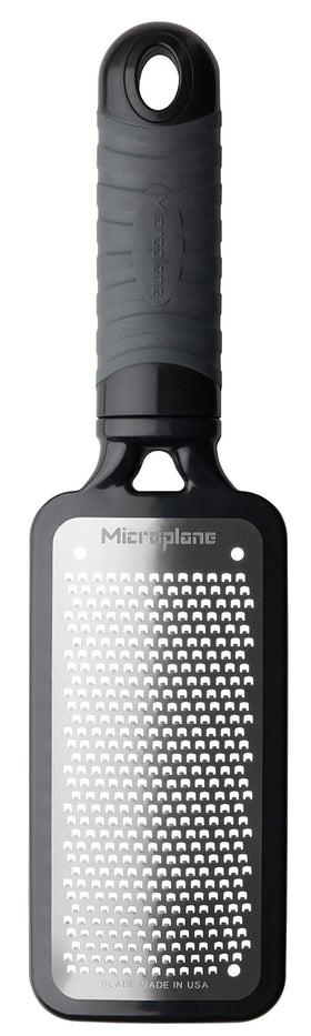 Microplane Home Series fine cheese grater with US stainless blades for hard cheeses.