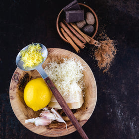 Microplane Home Series fine grater showing soft-touch handle for comfortable grip.