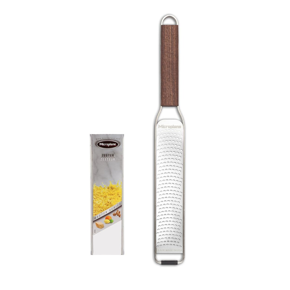 Microplane Master Series zester blade close-up showing ultra sharp stainless steel performance
