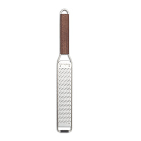 Microplane Master Series zester zesting action demonstrates precise citrus grating