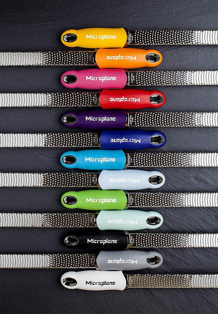Microplane Premium Classic kitchen tool in green, versatile in use.