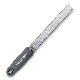 Microplane Premium Classic parmesan grater and lemon zester in grey, ready to zest