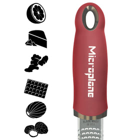 Microplane Premium Classic Zester Pomegranate Red, citrus zest in action for fresh flavor.