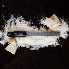 Ginger minced with Microplane Premium Classic Zester for smooth pastes.