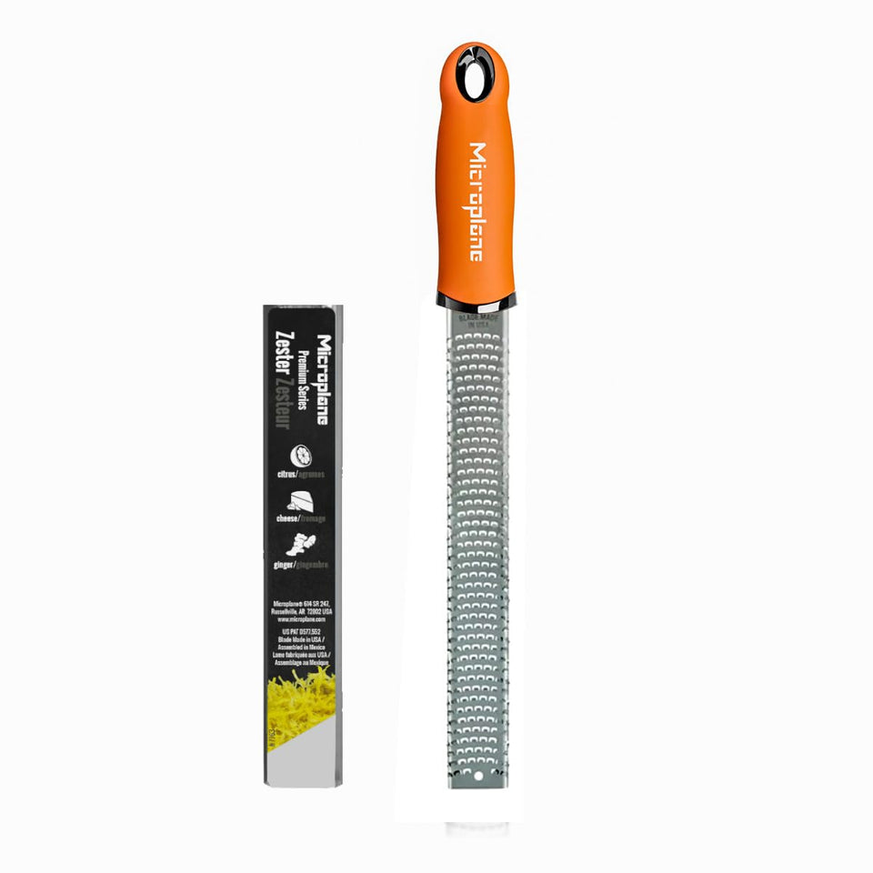 Microplane Premium Classic Zester Orange Peel close-up showing zest extraction