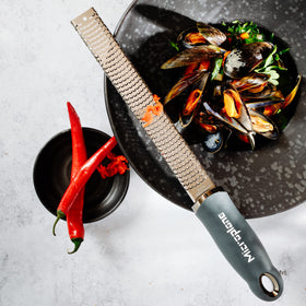 Microplane Premium Zester Grater garlic minced paste ready to cook.
