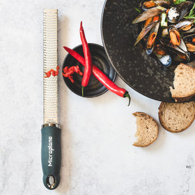 Microplane Premium Zester Grater nutmeg shaved into spice.