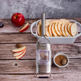 Microplane Professional Series Fine Grater in use for zesting citrus.