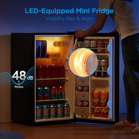 Midea MERM33S1ABB interior light brightens shelves for convenience.