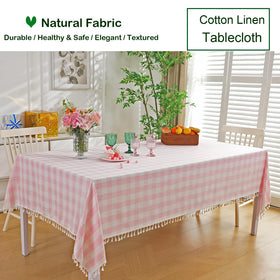 Midsummer Breeze pink tassel-edged tablecloth for casual and formal settings.