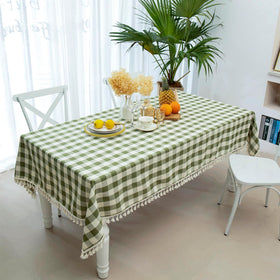 Midsummer Breeze heavy-weight cotton gingham tablecloth offers lasting color through celebrations.
