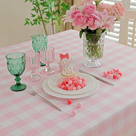 Midsummer Breeze pink cotton tablecloth with buffalo check pattern for seasonal tables.