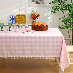 Midsummer Breeze rectangle pink gingham tablecloth with tassels enhances farmhouse dining.