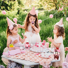 Mifoci clear and pink dessert cups highlight individual portions for parties.
