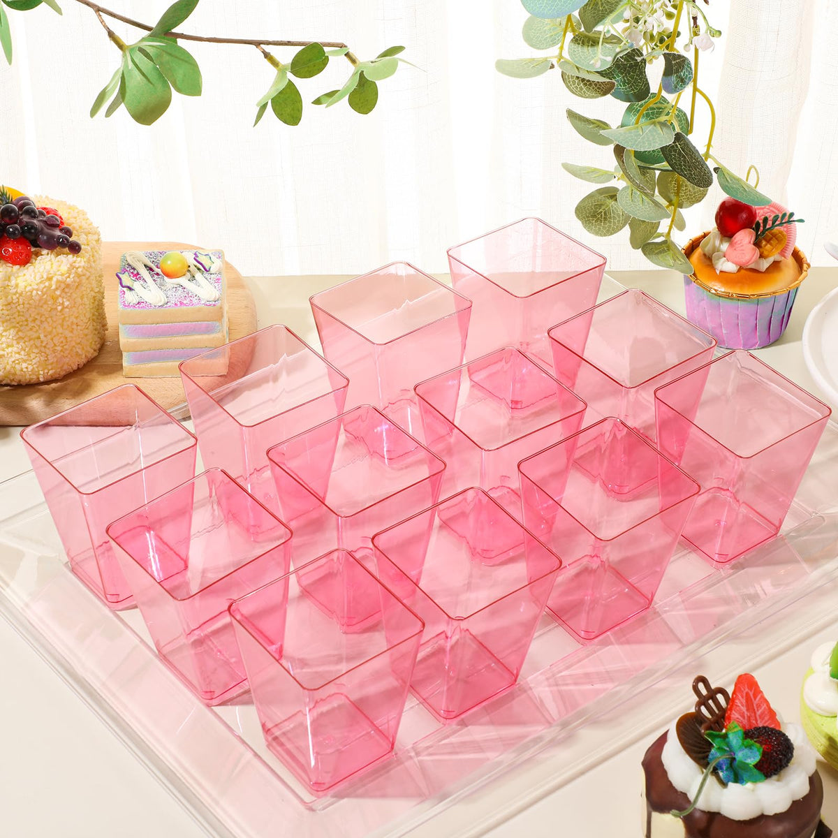 Mifoci plastic appetizer cups suitable for condiments and bite-sized treats.