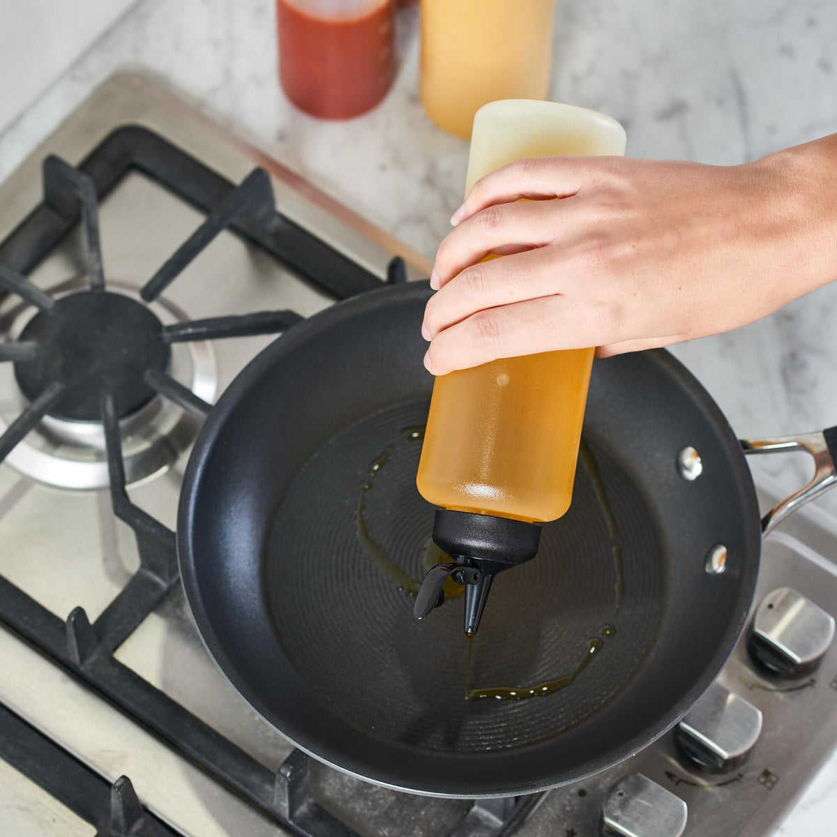 Mighty Strong measurement-markings help you dose sauces with confidence.