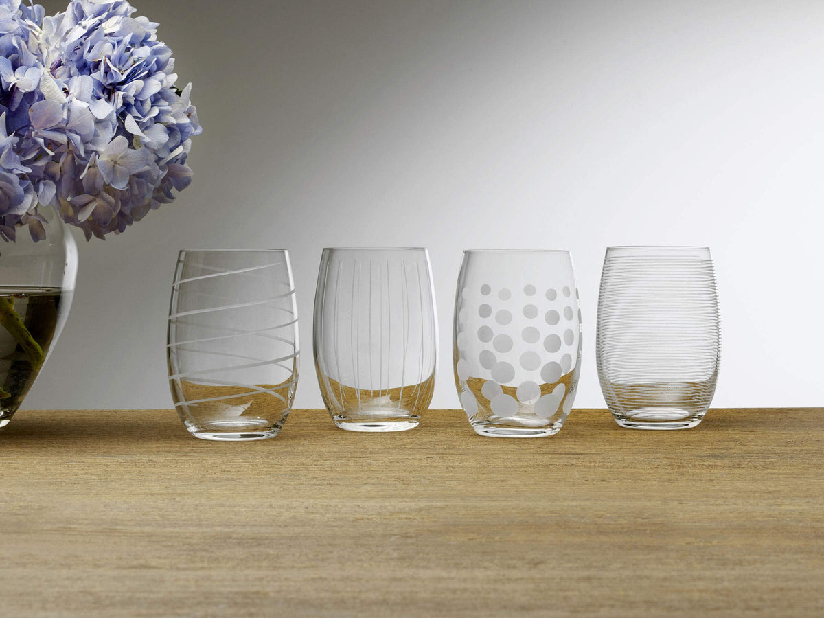 Elegant clear Mikasa Cheers glass with classic stemless silhouette for modern tables