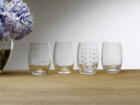 Elegant clear Mikasa Cheers glass with classic stemless silhouette for modern tables