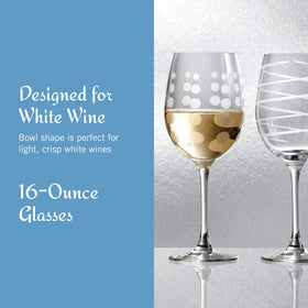 Mikasa Cheers glass with etched swirls detail for festive appeal.