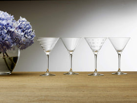 Mikasa Cheers martini glass with swirl design adds festive flair.