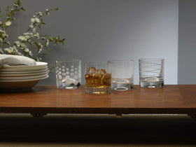 Mikasa Cheers set of four designs enhances party decor and gifting.