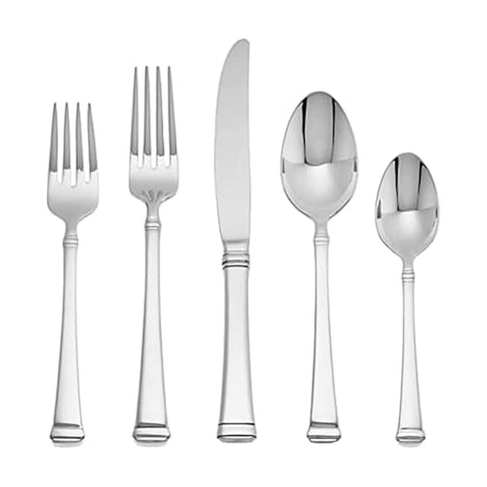 Mikasa Harmony 45-piece flatware set arranged for elegant dining; durable stainless steel.