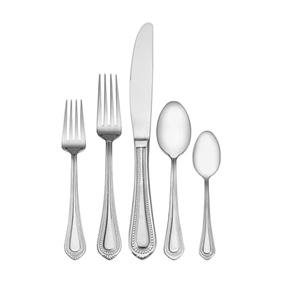 Mikasa Regent Bead 65-piece dinner set on table for twelve guests.