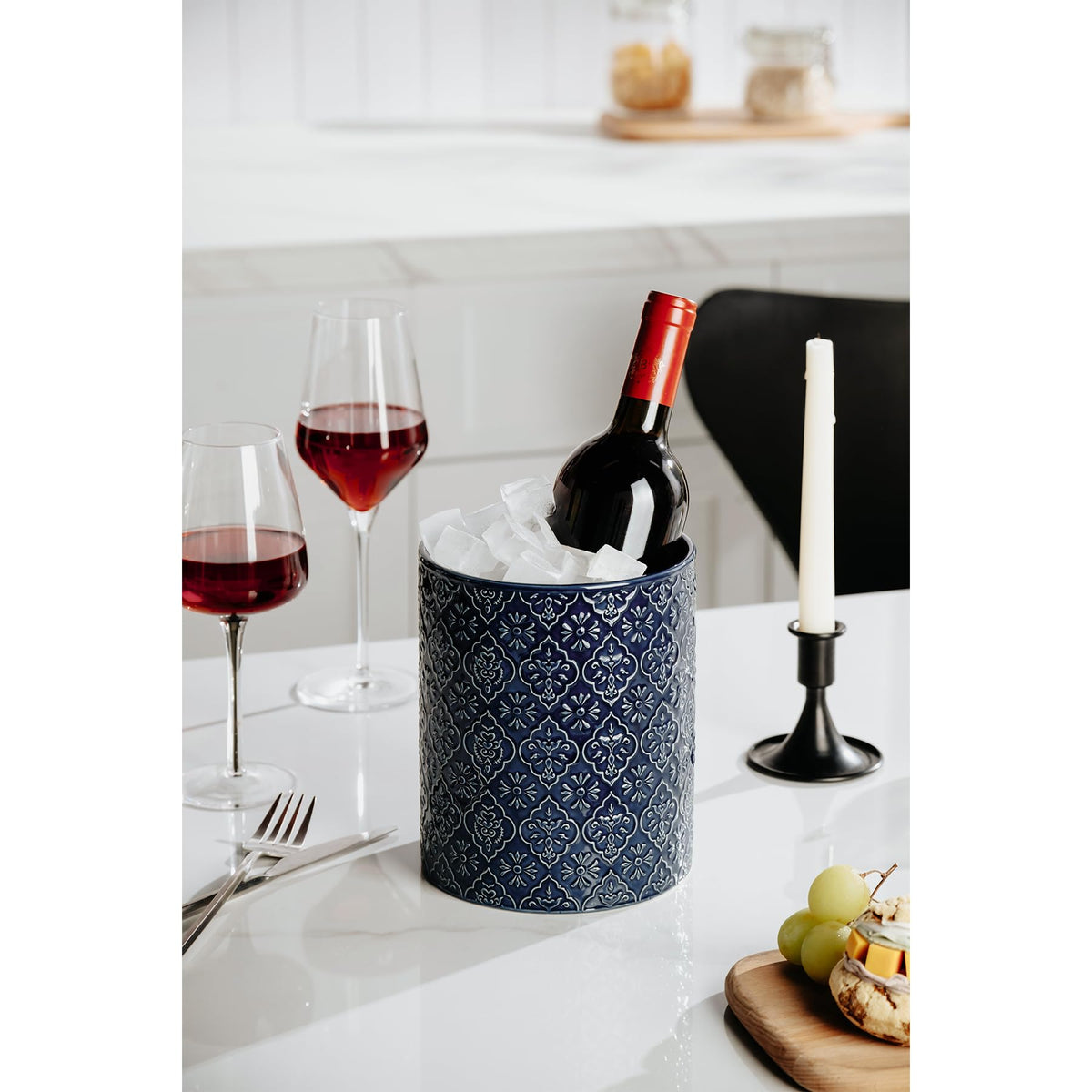 MIKIGEY blue utensil holder enhances kitchen decor and organization.
