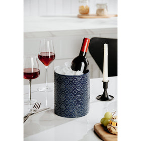 MIKIGEY blue utensil holder enhances kitchen decor and organization.