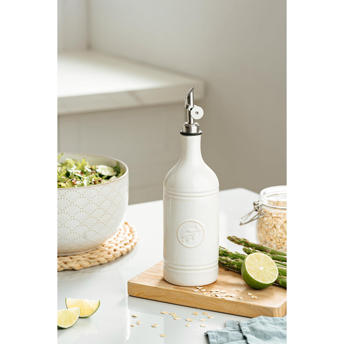 MIKIGEY ceramic cruet with olive leaf design adds rustic kitchen elegance.