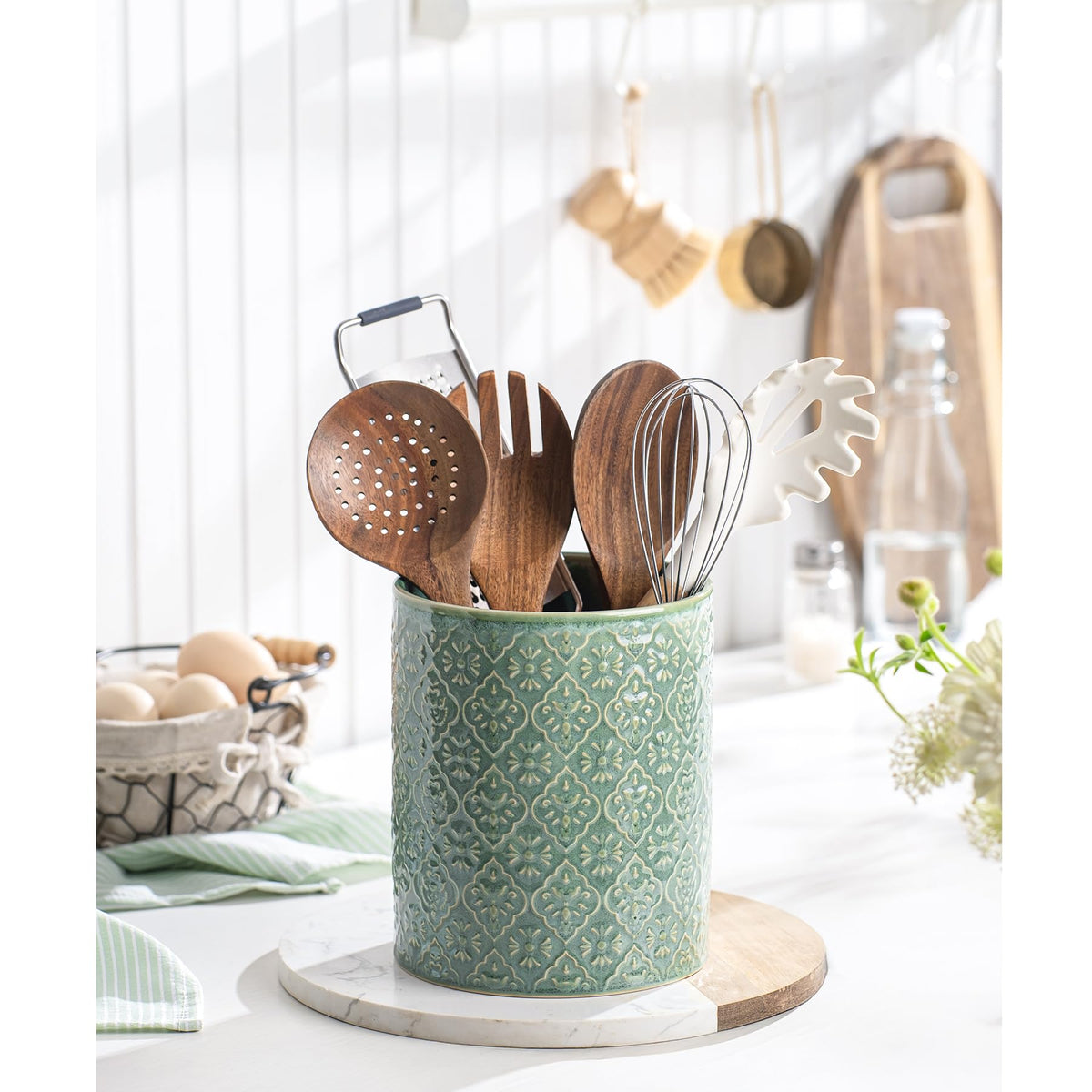 MIKIGEY heavy ceramic utensil crock provides stable counter support.