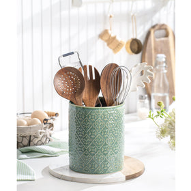 MIKIGEY heavy ceramic utensil crock provides stable counter support.