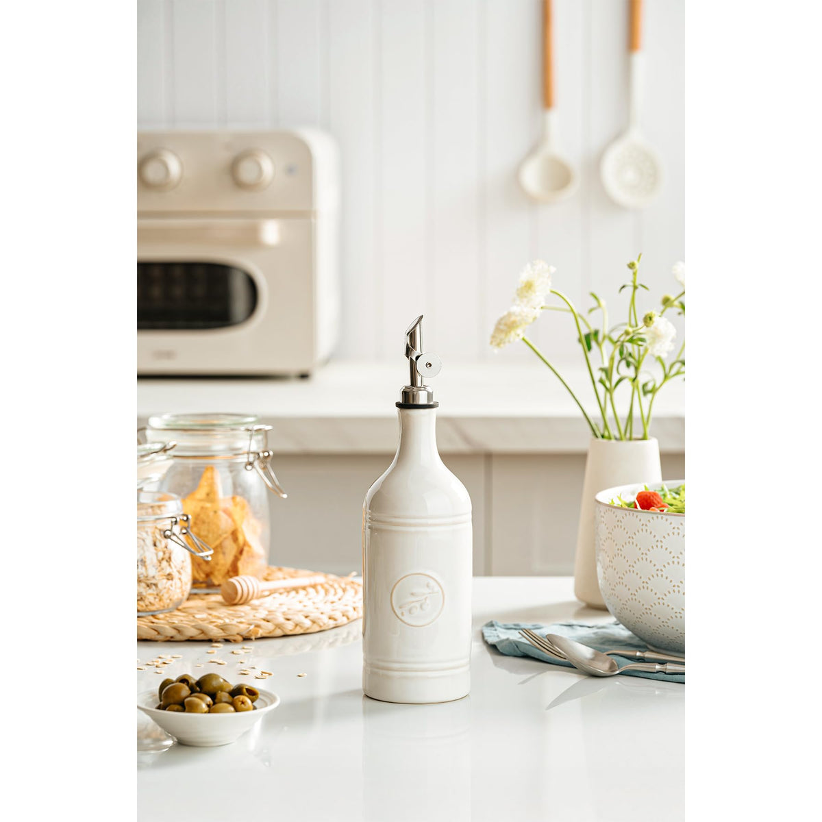 MIKIGEY UV-protected bottle helps keep olive oil fresher longer.