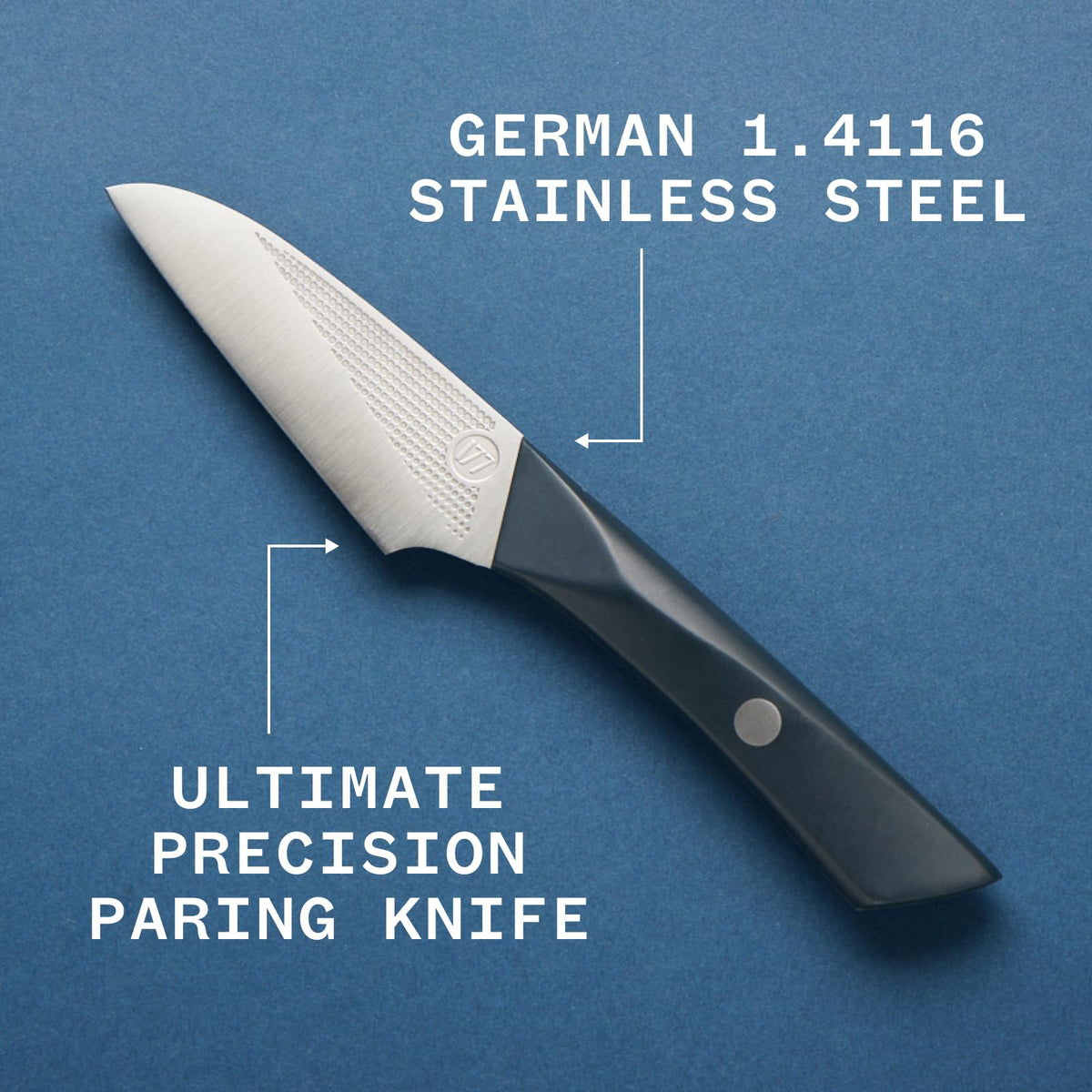 Milk Street Kitchin-kiji knife shows knuckle clearance for safer chopping.