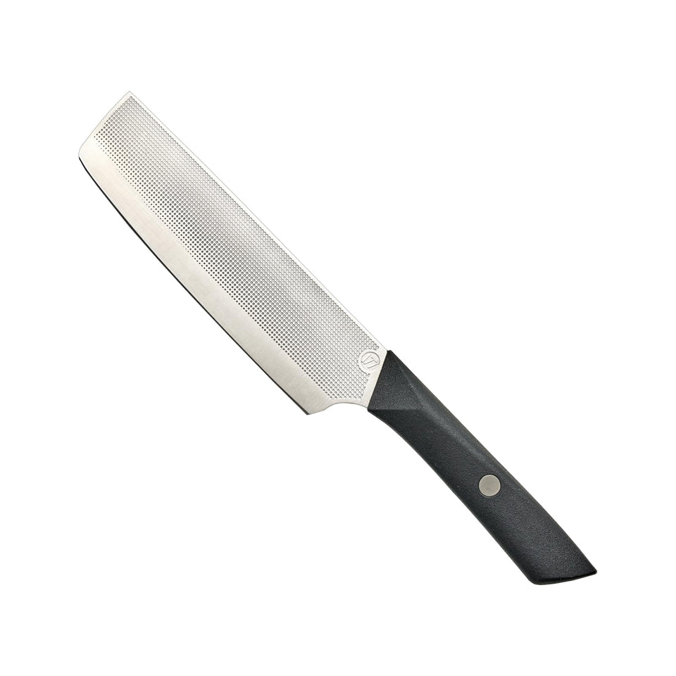 Milk Street Nakiri knife blade close-up showing precise edge for vegetables