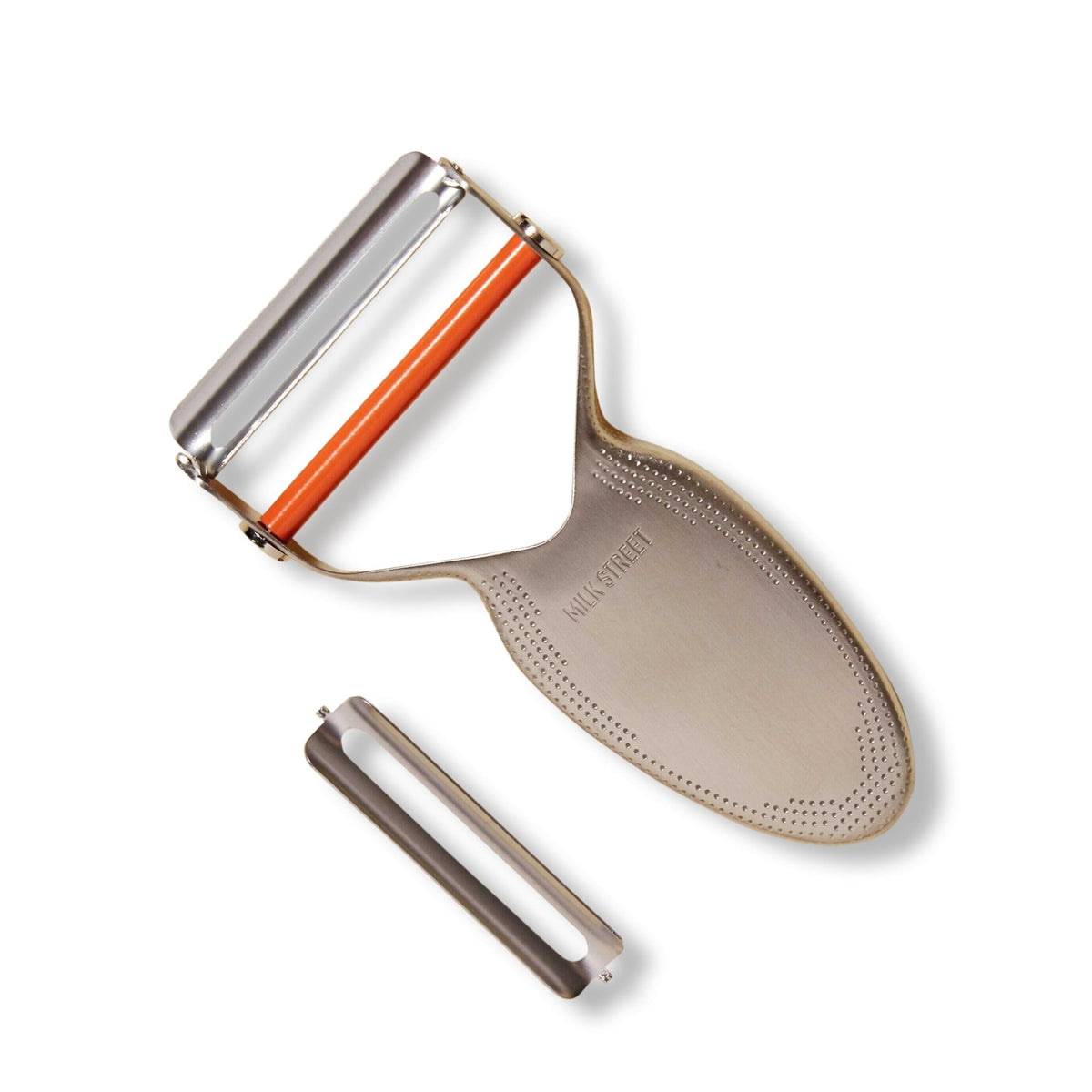 Milk Street Precision Peeler with stainless steel blade for smooth vegetable prep.