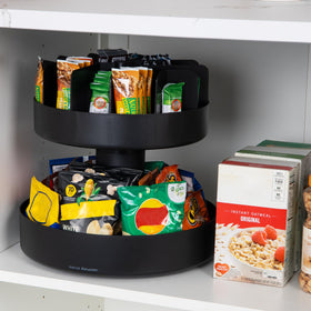 Mind Reader 2-Tier Snack Carousel Close-Up Cleaning demonstrates easy wipe-clean surfaces.