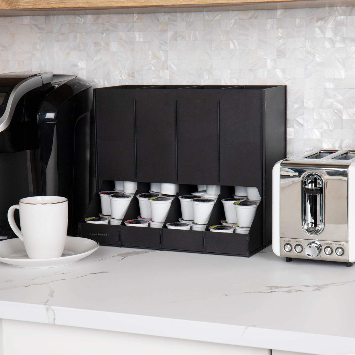 Mind Reader coffee pod dispenser front view highlights sleek black design for modern office spaces.
