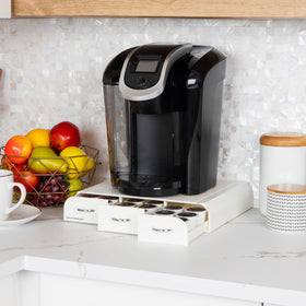 Mind Reader pod drawer under coffee maker keeps pods within easy reach