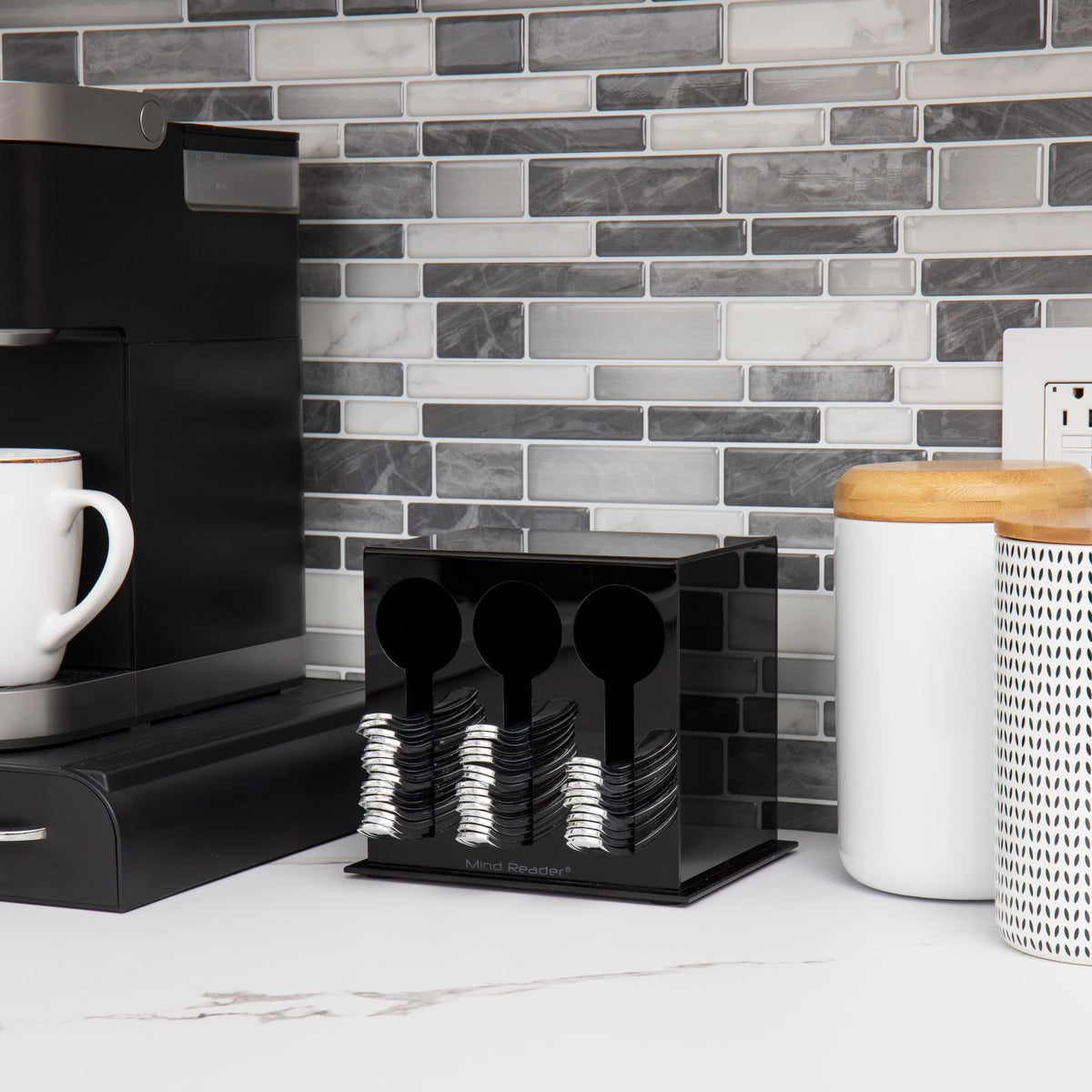 Mind Reader silverware organizer with three compartments separates wrapped and unwrapped utensils.