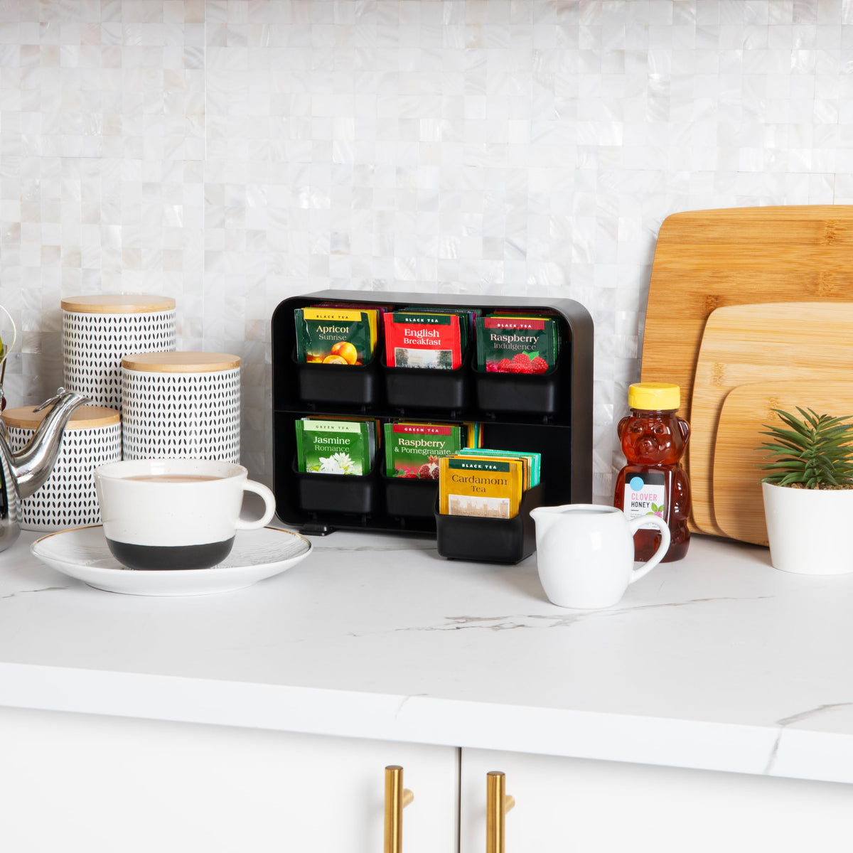 Mind Reader organizer with drawer open shows removable compartments for easy refills.