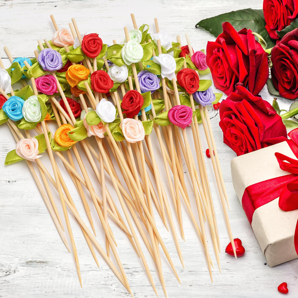 Minisland wedding catering display featuring colorful rose picks on a tray.