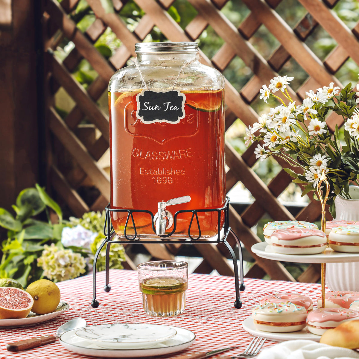 MiraEase glass dispenser with chalkboard label, perfect for keeping beverages organized.