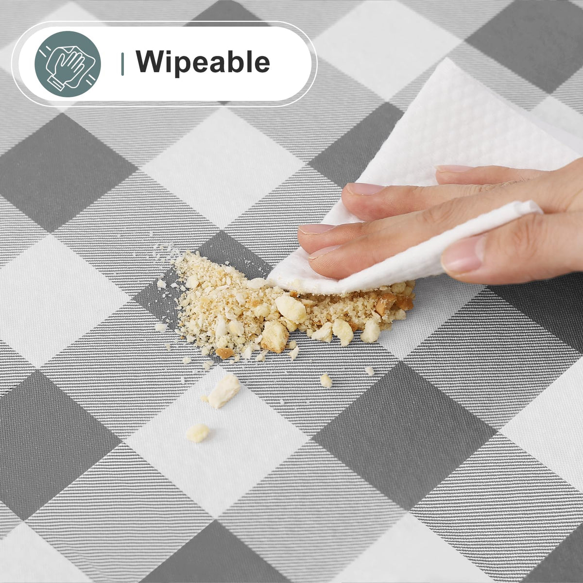 Misaya wipe-clean capability demonstrated with a damp cloth for quick refresh.