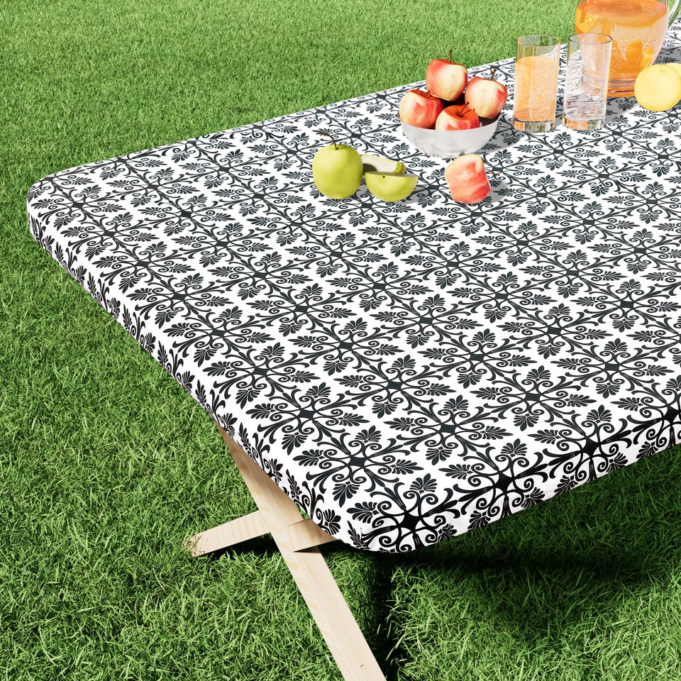 Misaya rectangle vinyl table cloth with elastic edge for a secure, non-slip fit.