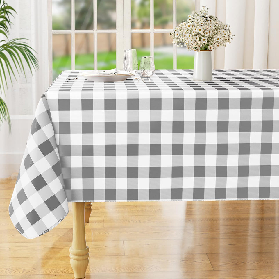 Misaya waterproof rectangle tablecloth protects against spills with a durable vinyl surface.