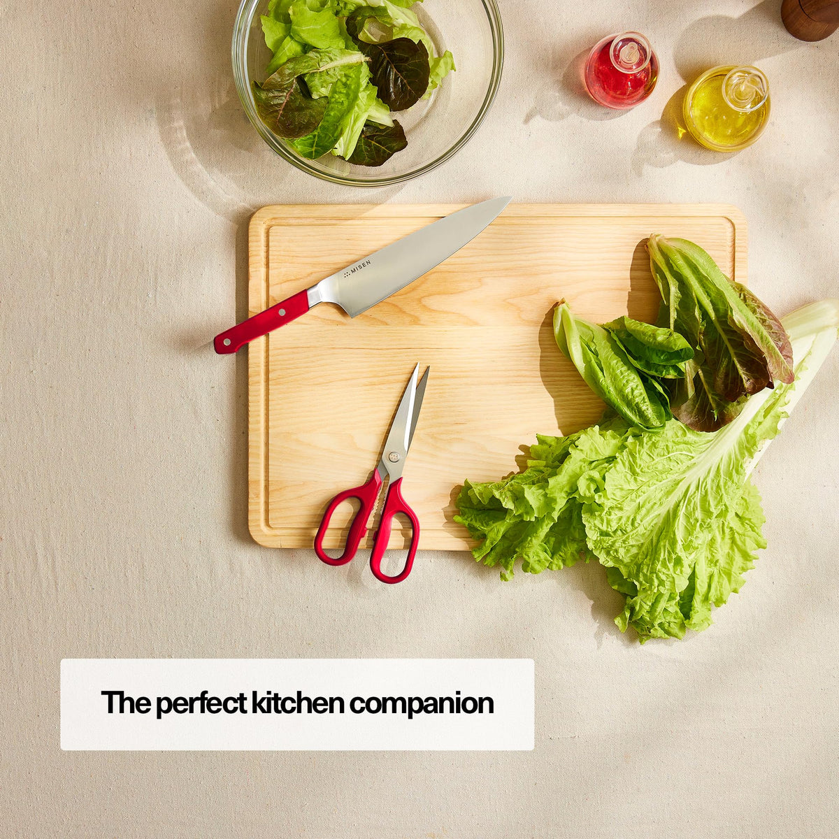 Misen shears snip fresh herbs for quick prep.