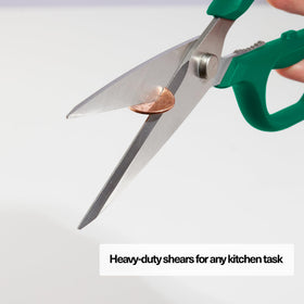 Misen kitchen shears in use for meat and poultry.