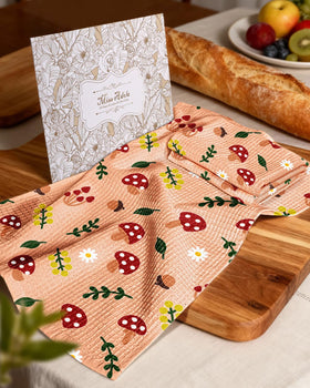 Miss Adola absorbent waffle towel highlights mushroom motif for everyday kitchen tasks
