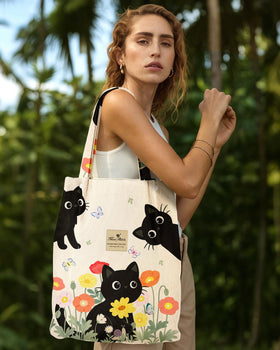 Miss Adola corduroy tote bag magnetic closure secures belongings with quick access.